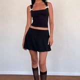 Jiniso Crop Top In Black With Ivory Bows