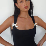 Jiniso Crop Top In Black With Ivory Bows