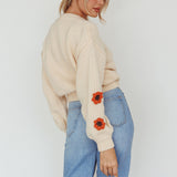 Lighthouse Flower Accent Sweater Cream