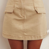 Caught Out Faux Pocket Mini Skirt Beige