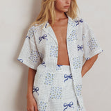 Ithaca Wrap Mini Skirt Bow Print Blue
